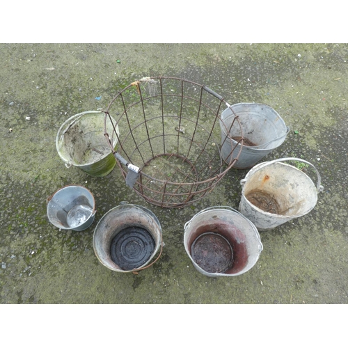 637 - A large lot of vintage buckets and a large wire basket.