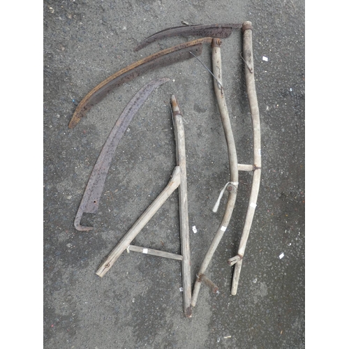 640 - Two wooden scythes and more.