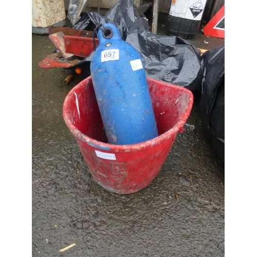 697 - A vintage fire bucket and a fishing buoy.