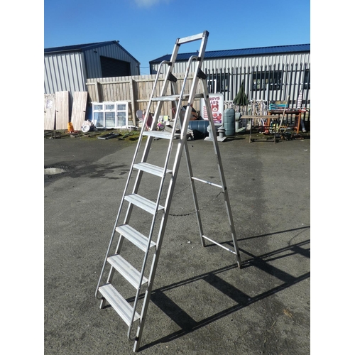 702 - A large folding step ladder.