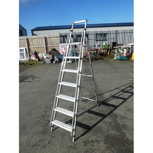 702 - A large folding step ladder.