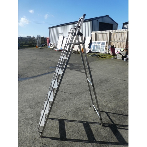 702 - A large folding step ladder.