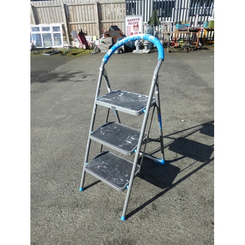 706 - A folding step ladder.