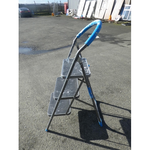 706 - A folding step ladder.