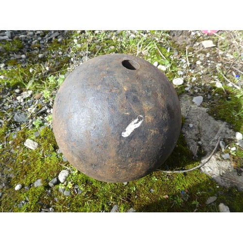 713 - An antique cannon ball