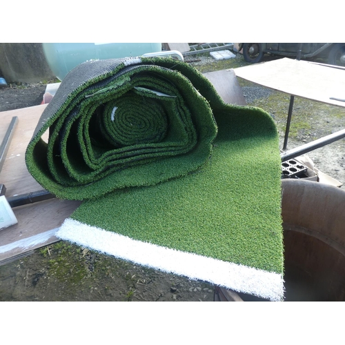 724 - A roll of artificial turf.