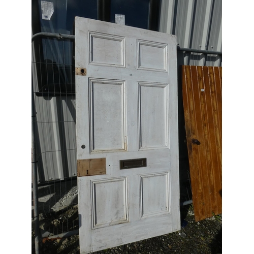 728 - A large vintage wooden door, measuring 211cm x 106cm x 5cm.