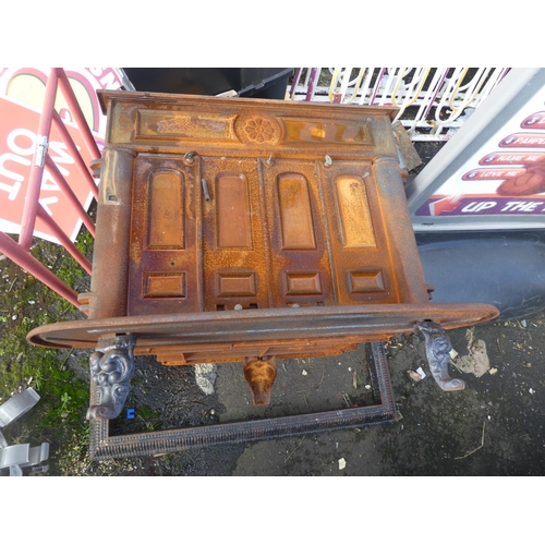 761 - A large cast iron stove for restoration.  Approx 84x82x60cm.