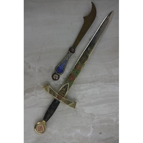 83 - 2 vintage letter openers, modelled as swords.  Approx  15cm.