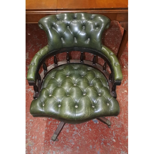 632 - A stunning leather upholstered swivel Captains chair