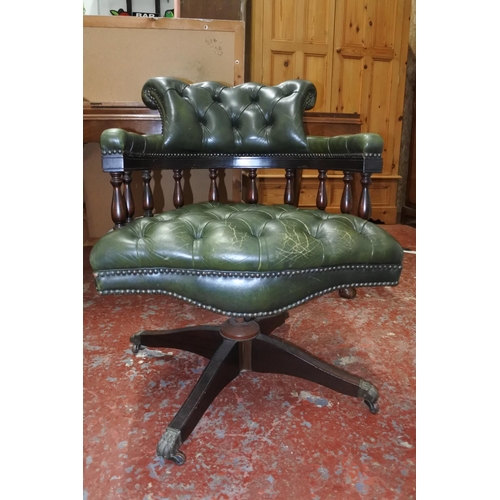 632 - A stunning leather upholstered swivel Captains chair