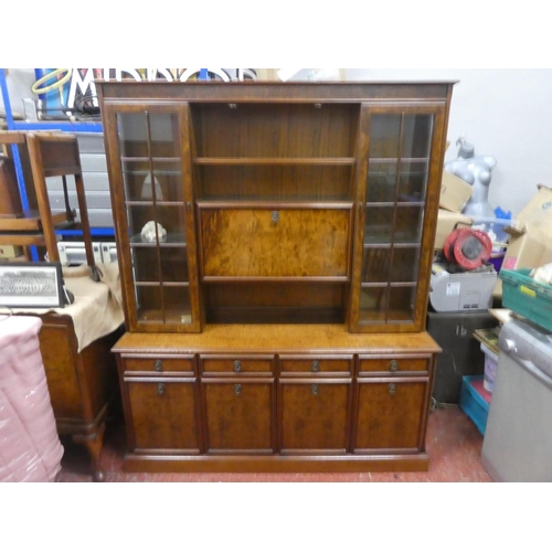 726 - A stunning walnut effect display cabinet with light up display panel. Approx 190x158x45cm.