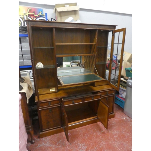 726 - A stunning walnut effect display cabinet with light up display panel. Approx 190x158x45cm.