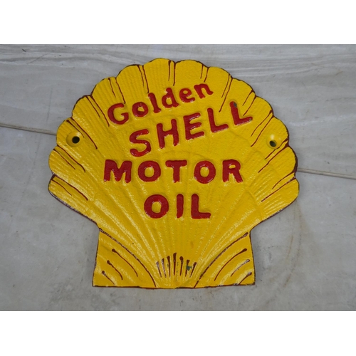 25 - A cast iron Golden Shell Motor Oil plaque.  Approx 17x17cm.