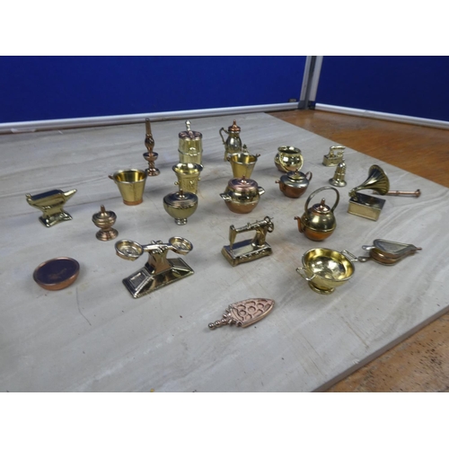 26 - A collection of metal and brass figures.