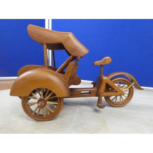 61 - A wooden model of a pedal rickshaw.