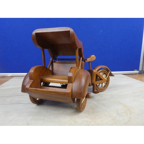 61 - A wooden model of a pedal rickshaw.