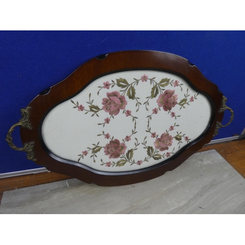 78 - A two handled serving tray with needlework panel.