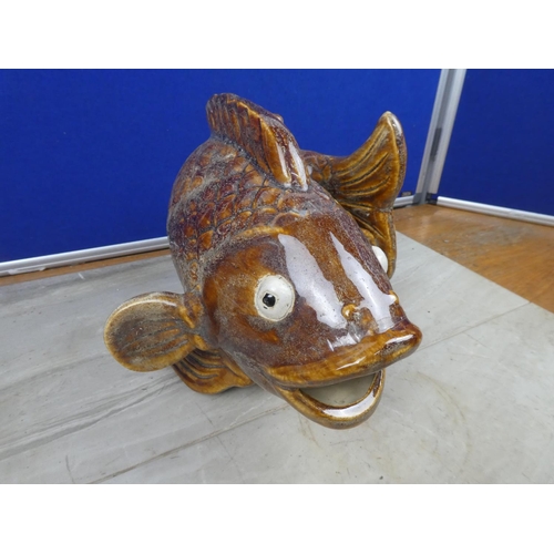 83 - A stunning brown glazed vase in the style of a fish.  Approx 28cm.