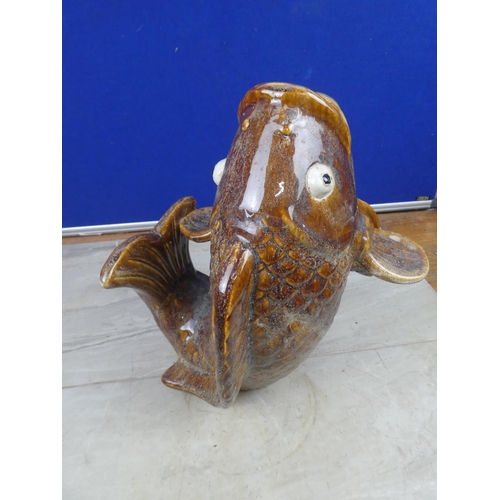 83 - A stunning brown glazed vase in the style of a fish.  Approx 28cm.