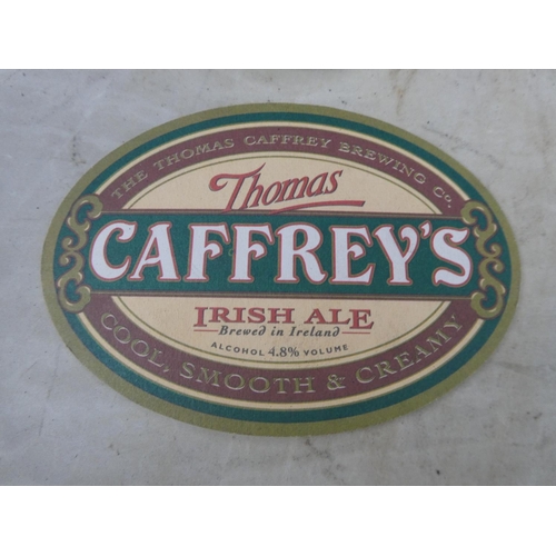 84 - A lot of Caffrey's coasters.