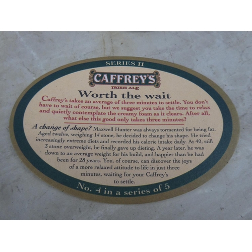 84 - A lot of Caffrey's coasters.