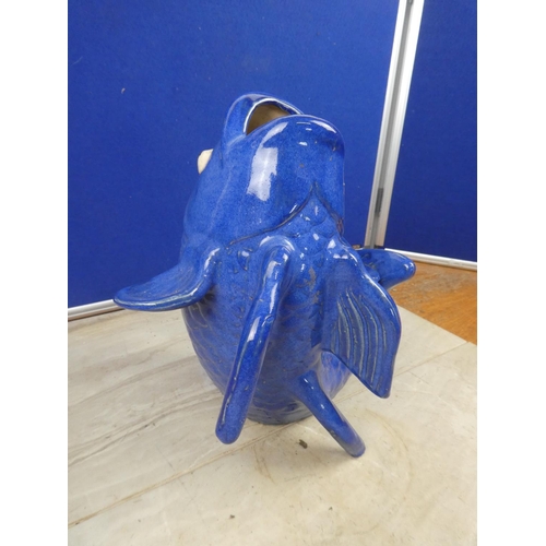 90 - A stunning blue glazed vase in the style of a fish.