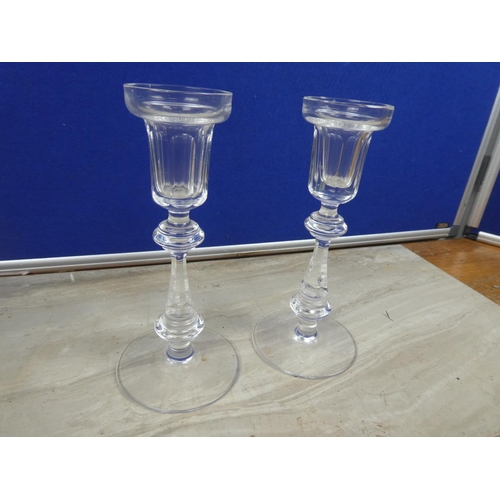 93 - A stunning pair of Waterford Crystal candlesticks.