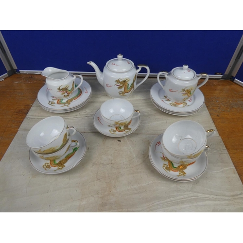 94 - A vintage Japanese 'Geisha Girl' tea set. (a/f).