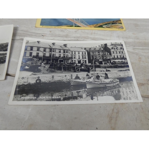 96 - A lot of vintage postcards and a vintage set of photographs of Paris by Guy Paris and more.