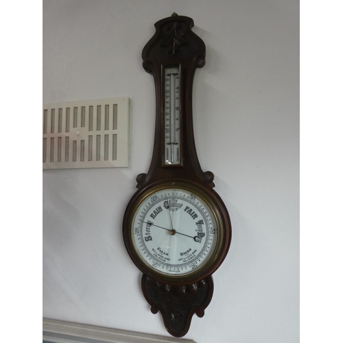 201 - An antique mahogany banjo barometer (a/f).  Approx 80cm.