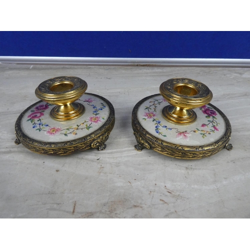 209 - A pair of gilt metal candlesticks with handstitched floral detail and a matching lidded trinket dish... 