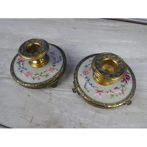 209 - A pair of gilt metal candlesticks with handstitched floral detail and a matching lidded trinket dish... 