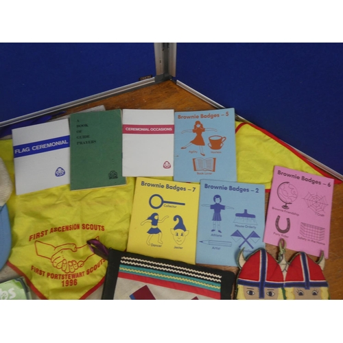 210 - A large collection of Scout's and Brownie's leaflets, badges, flags and more.