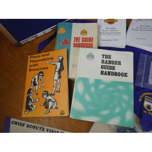 210 - A large collection of Scout's and Brownie's leaflets, badges, flags and more.