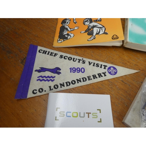 210 - A large collection of Scout's and Brownie's leaflets, badges, flags and more.