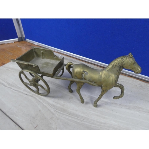 213 - A brass horse and cart.