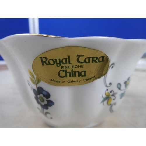 223 - A Royal Tara bone china 'Tara Hall' milk jug and sugar bowl.