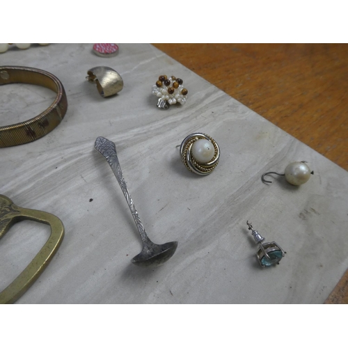 224 - A large job lot of various jewellery, bangles, bottle opener, whistle and lots more.