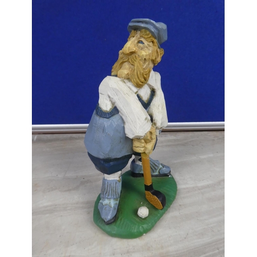 227 - A David Frykman figure of a golfer.