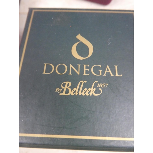 229 - A Belleek Donegal pottery brooch and more.