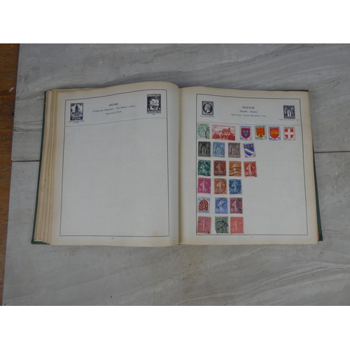 251 - A vintage 'The Strand Stamp Album' and contents.