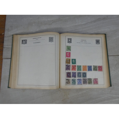 251 - A vintage 'The Strand Stamp Album' and contents.