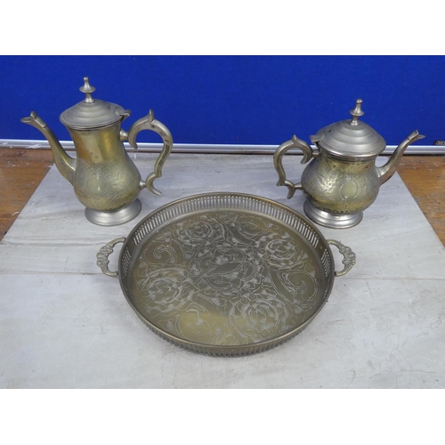 263 - A pair of silver plated coffee and teapots on a serving tray.