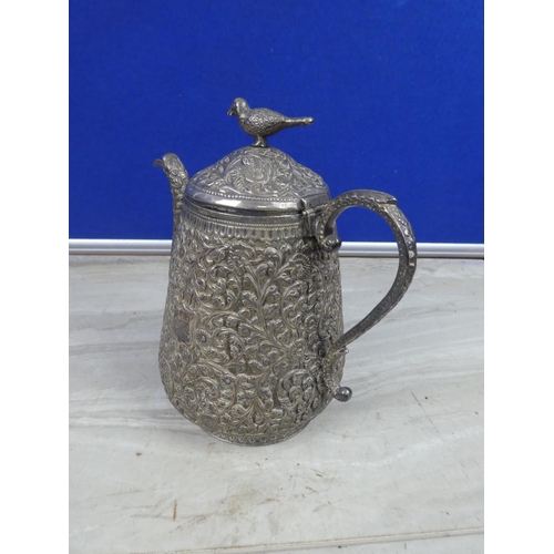 269 - A stunning and highly decorative silver plated coffee pot.