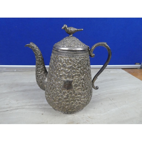 269 - A stunning and highly decorative silver plated coffee pot.