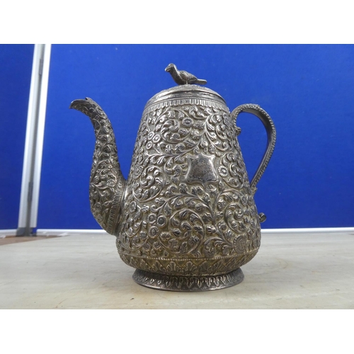 269 - A stunning and highly decorative silver plated coffee pot.