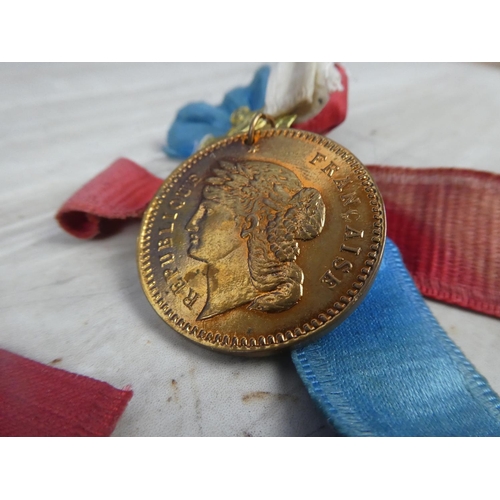 273 - Two French medals and ribbons.