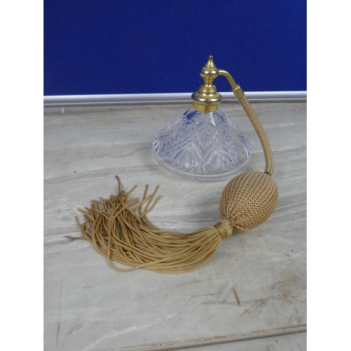 280 - A vintage glass perfume atomizer with cream ivory tassel.