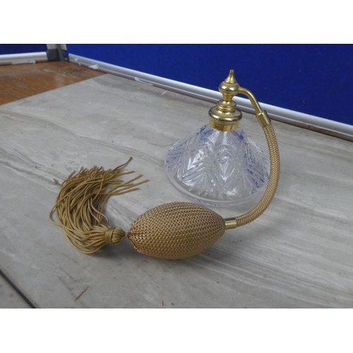 280 - A vintage glass perfume atomizer with cream ivory tassel.